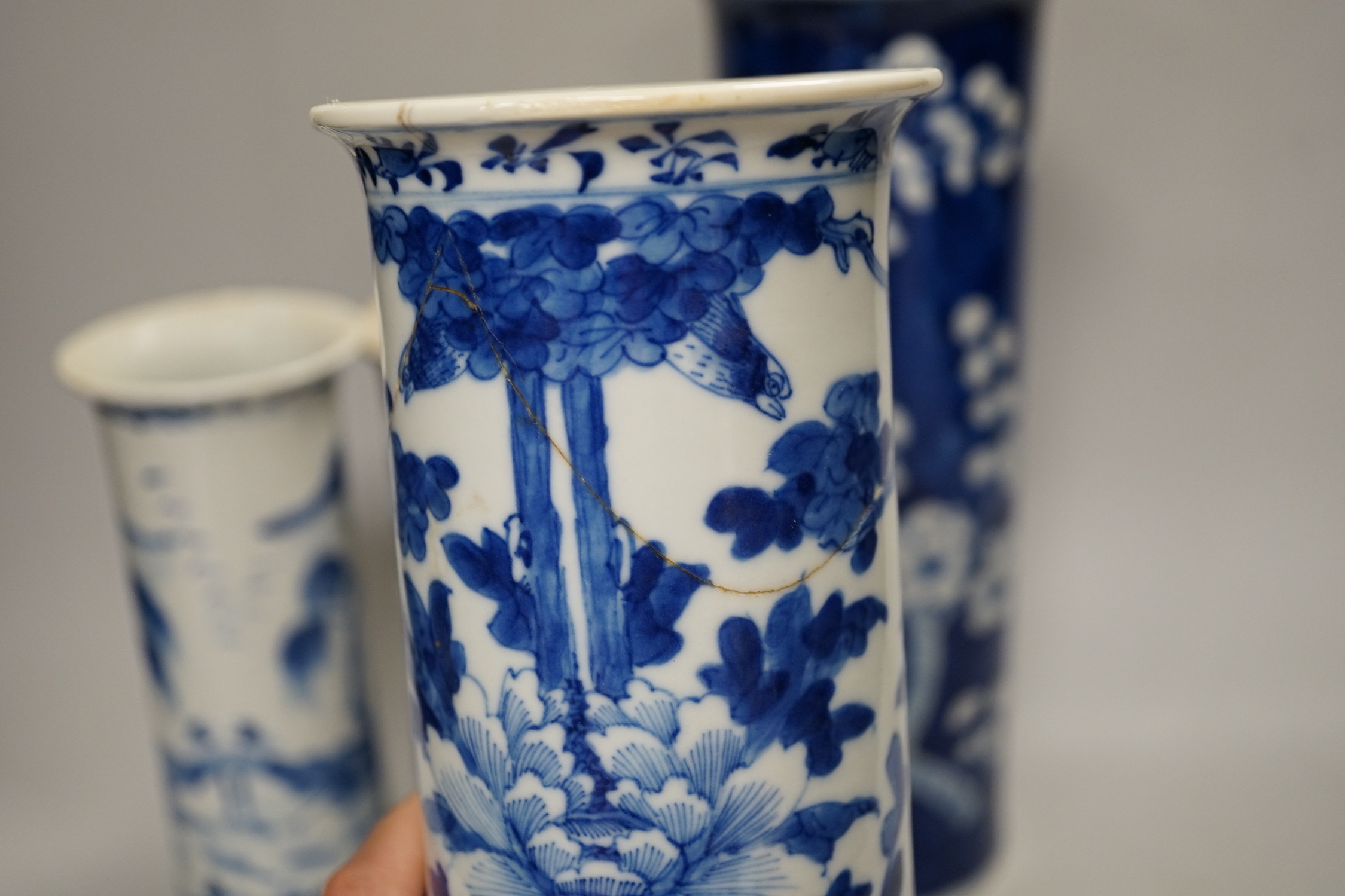 Nine assorted Chinese blue and white cylinder vases, 19th/20th century, tallest 30cm high (a.f.)